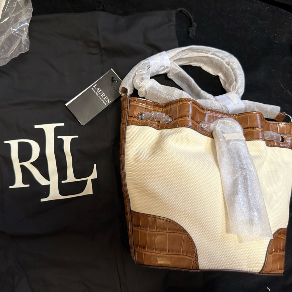 Brand new woman’s purse with packing stone in it.